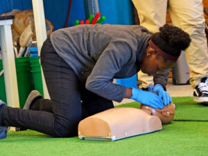 NESS student practicing CPR